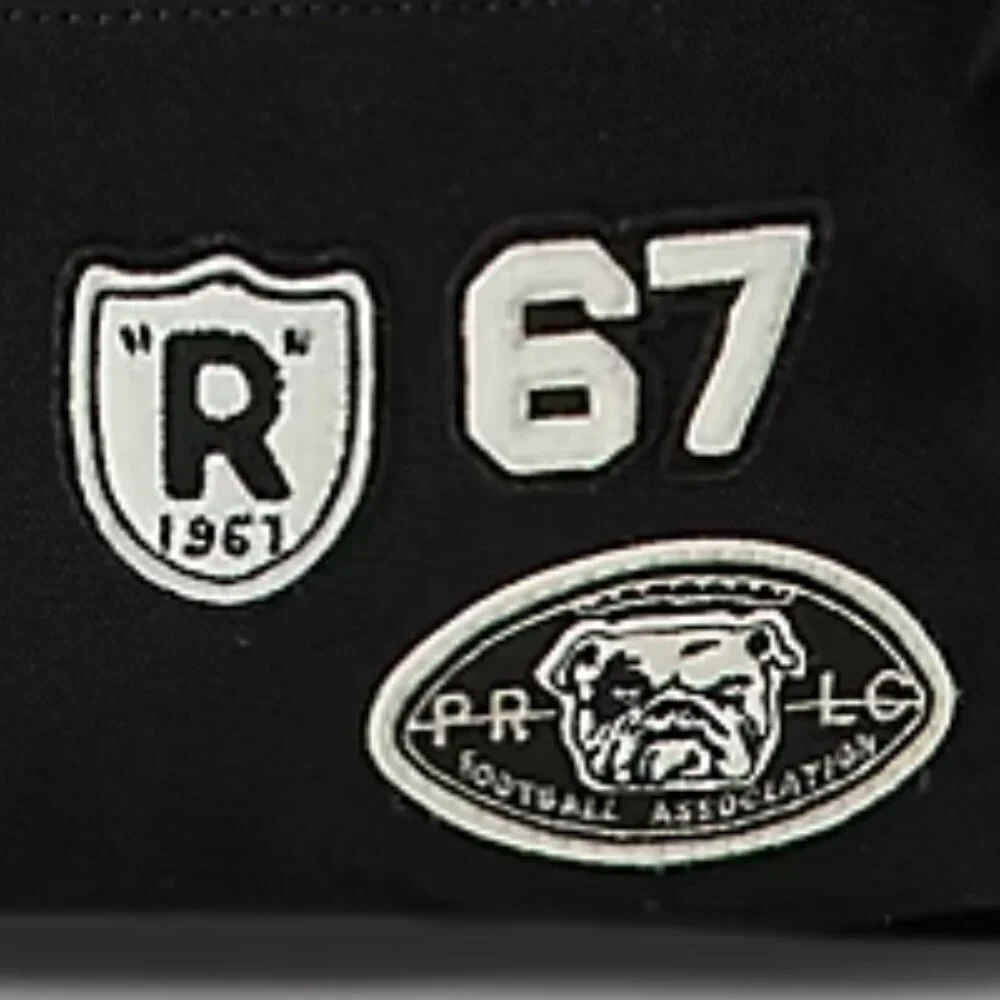 Ralph Lauren Letter Patch Cotton Canvas Backpack with sporty signature patches.